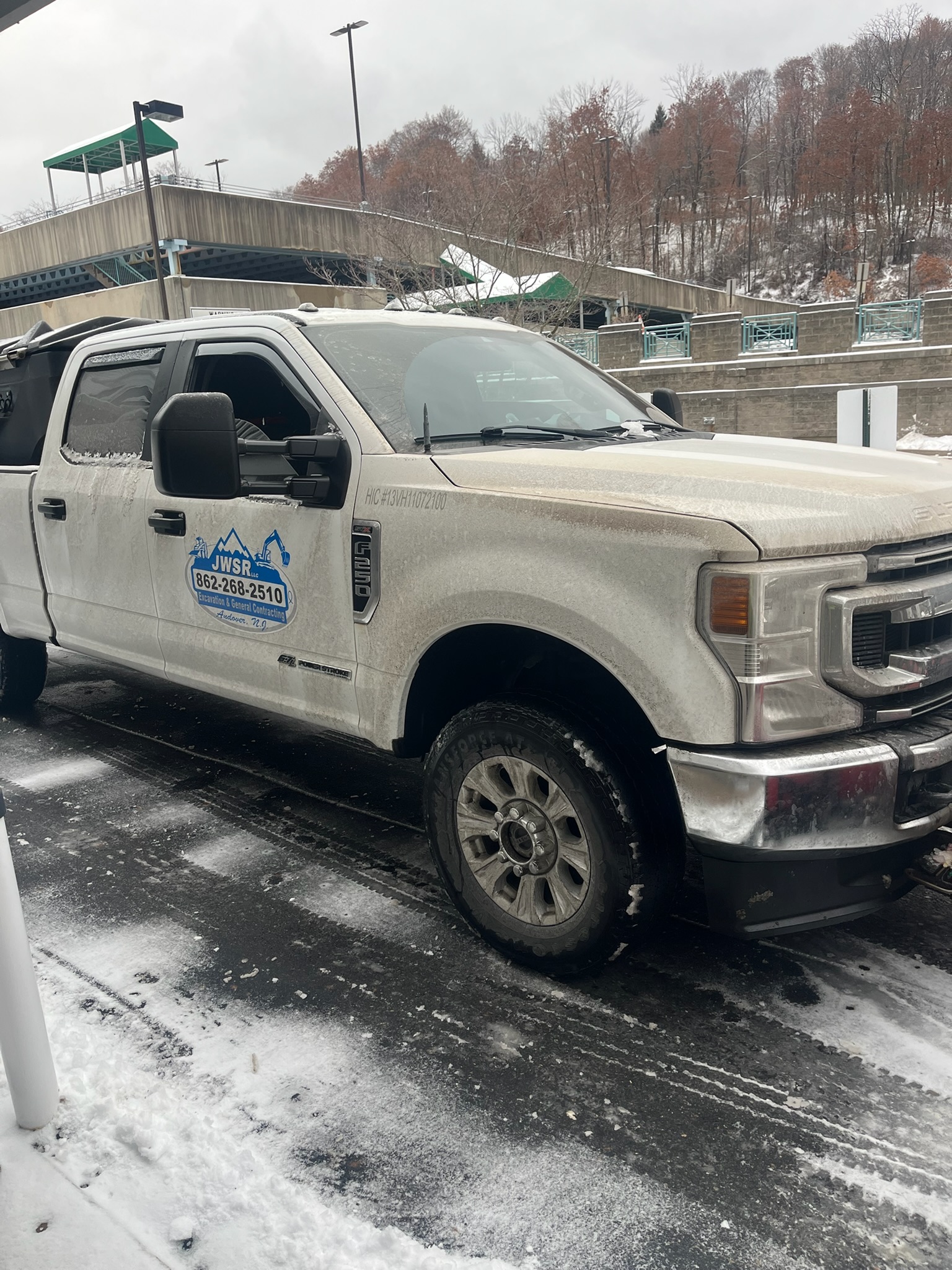 JRW Services truck between routes on a New Jersey highway